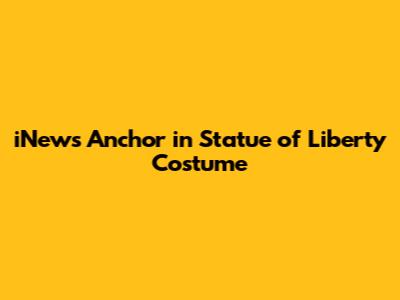 iNews Anchor in Statue of Liberty Costume